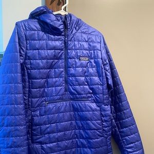 Patagonia size L puffy coat with hood and hand warmer pocket.
